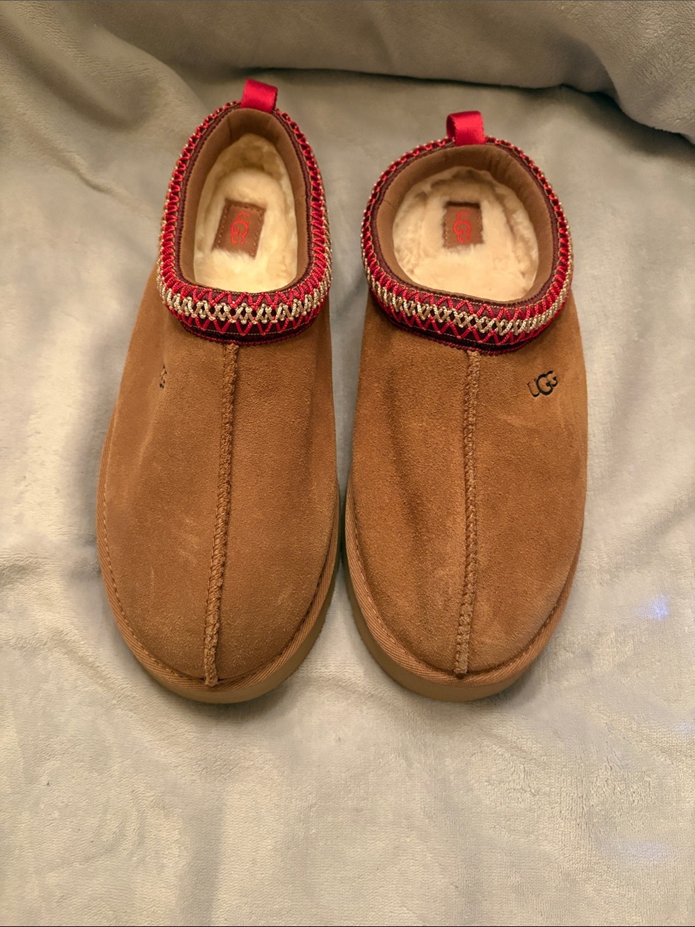 UGG kids Chestnut Suede Slip-On Slippers with Red Trim